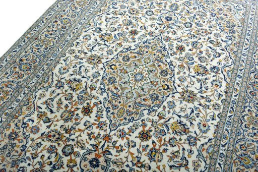 Backside of handmade 2000s Kashan rug showing knot structure and weave density