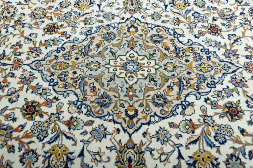 Central medallion detail of 2000s Kashan rug from Iran / Persia