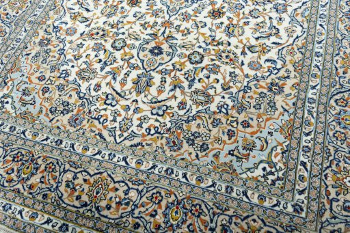 Close-up detail of 2000s Kashan rug from Iran / Persia showing Wool weave