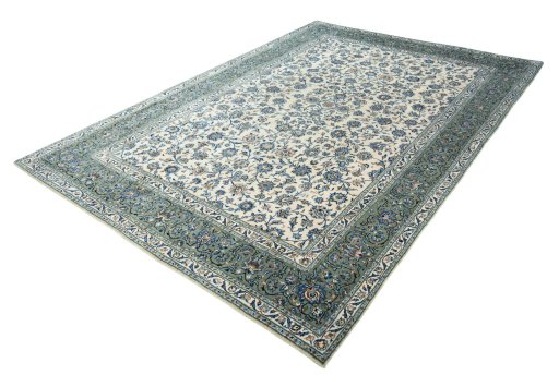 Corner detail of 2000s Kashan rug showing border pattern and Wool pile