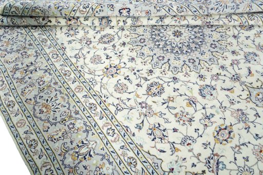 Close-up detail of 2000s Kashan rug from Iran / Persia showing Wool weave