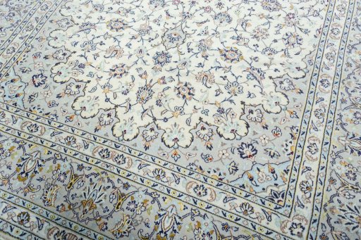 Close-up detail of 2000s Kashan rug from Iran / Persia showing Wool weave