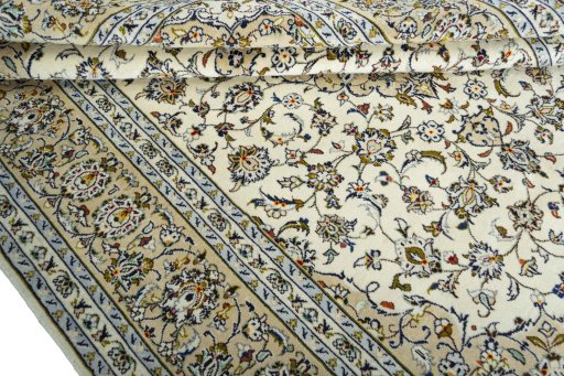 Close-up detail of 2000s Kashan rug from Iran / Persia showing Wool weave