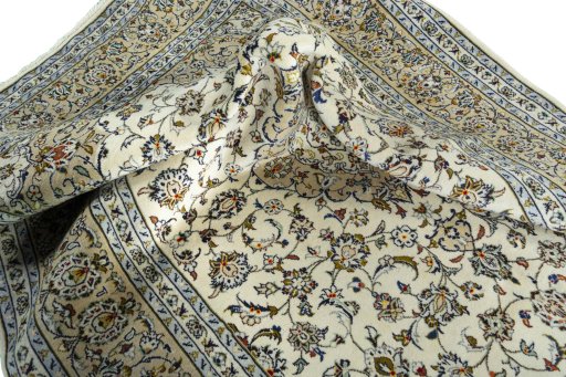 Surface texture of 2000s Kashan rug with natural Wool and intricate pattern