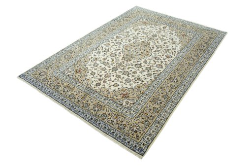 Corner detail of 2000s Kashan rug showing border pattern and Wool pile