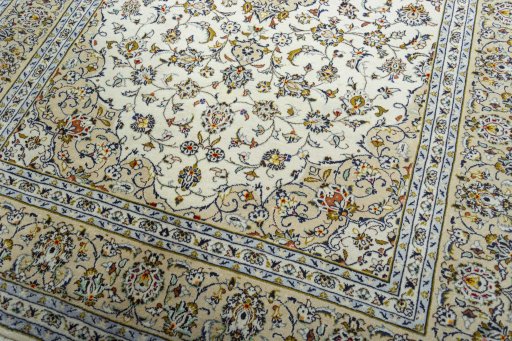 Close-up detail of 2000s Kashan rug from Iran / Persia showing Wool weave