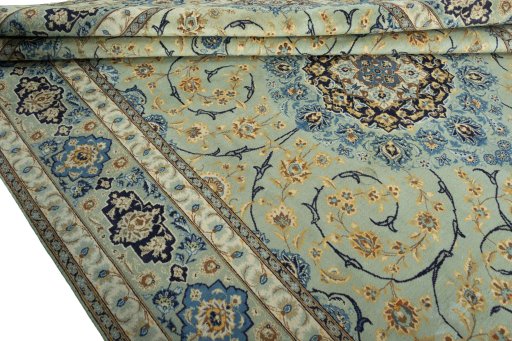 Close-up detail of 2000s Kashan rug from Iran / Persia showing Wool weave