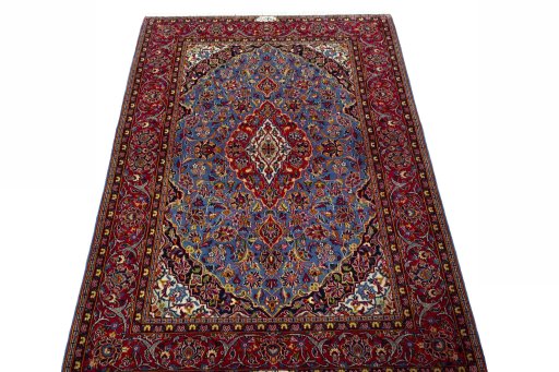Surface texture of 2000s Kashan rug with natural Wool and intricate pattern