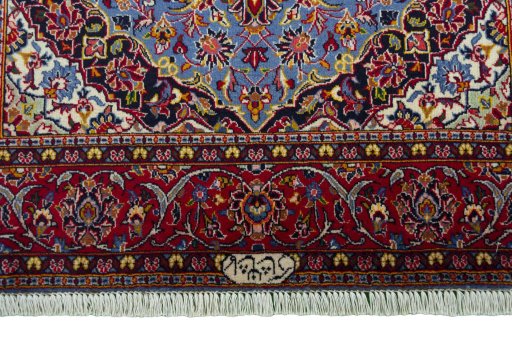 Close-up detail of 2000s Kashan rug from Iran / Persia showing Wool weave