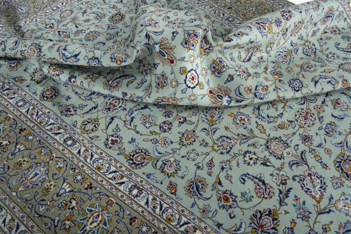 Close-up detail of 2000s Kashan rug from Iran / Persia showing Wool weave