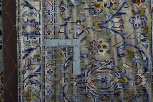 Surface texture of 2000s Kashan rug with natural Wool and intricate pattern