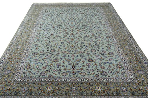 Surface texture of 2000s Kashan rug with natural Wool and intricate pattern