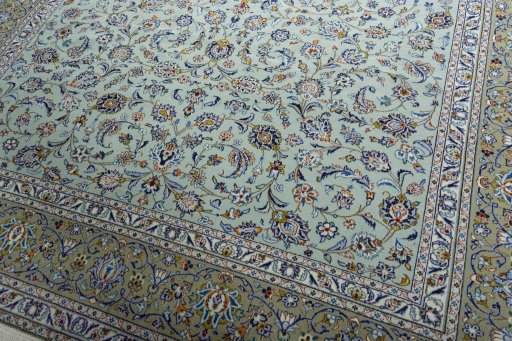 Central medallion detail of 2000s Kashan rug from Iran / Persia