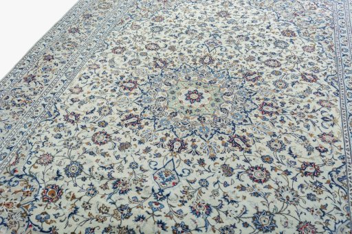 Backside of handmade 2000s Kashan rug showing knot structure and weave density