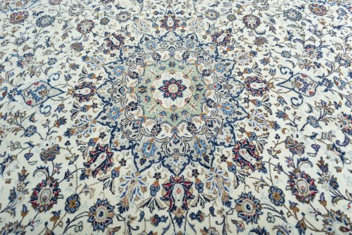 Central medallion detail of 2000s Kashan rug from Iran / Persia