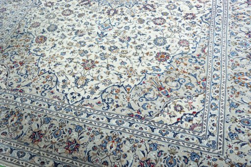 Close-up detail of 2000s Kashan rug from Iran / Persia showing Wool weave