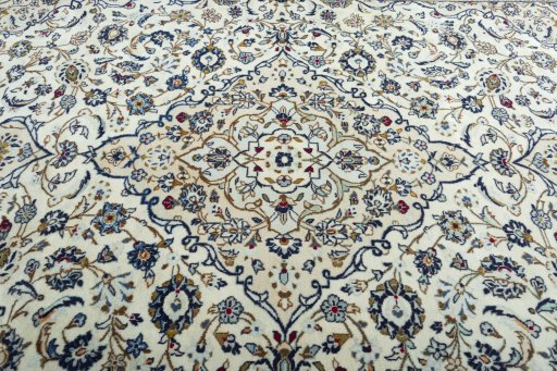 Central medallion detail of 2000s Kashan rug from Iran / Persia