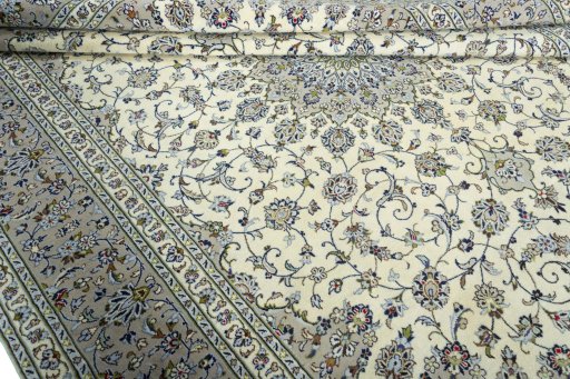 Close-up detail of 2000s Kashan rug from Iran / Persia showing Wool weave