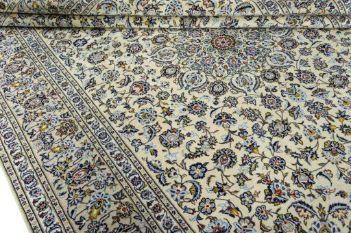 Close-up detail of 2000s Kashan rug from Iran / Persia showing Wool weave