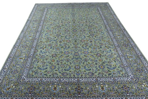 Surface texture of 2000s Kashan rug with natural Wool and intricate pattern