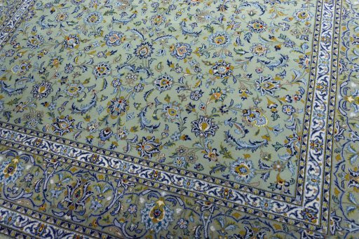 Close-up detail of 2000s Kashan rug from Iran / Persia showing Wool weave