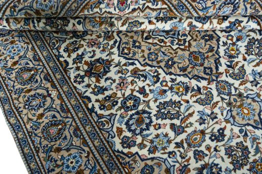 Close-up detail of 2000s Kashan rug from Iran / Persia showing Wool weave