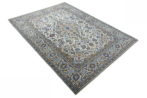 Close-up detail of 2000s Kashan rug from Iran / Persia showing Wool weave