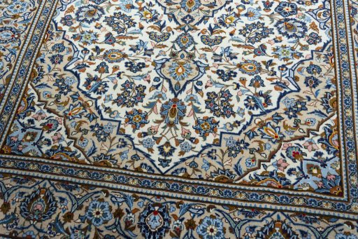 Close-up detail of 2000s Kashan rug from Iran / Persia showing Wool weave