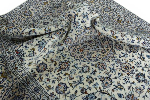 Surface texture of 2000s Kashan rug with natural Wool and intricate pattern