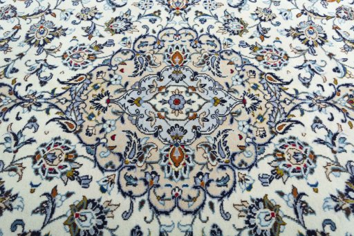 Central medallion detail of 2000s Kashan rug from Iran / Persia