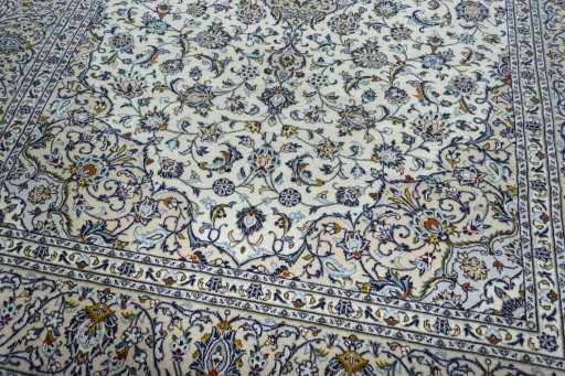 Close-up detail of 2000s Kashan rug from Iran / Persia showing Wool weave