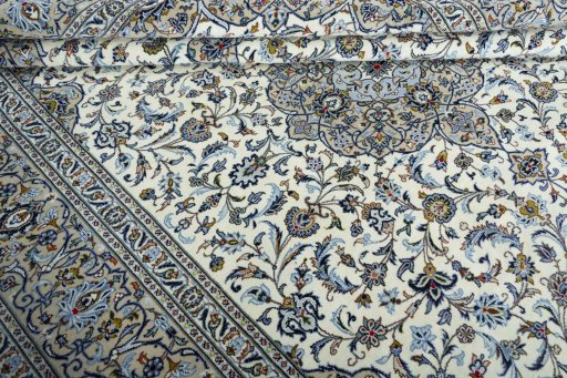 Close-up detail of 2000s Kashan rug from Iran / Persia showing Wool weave