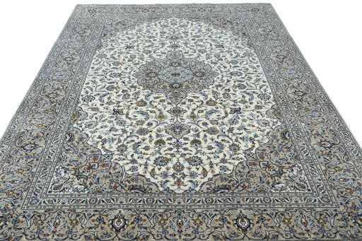 Surface texture of 2000s Kashan rug with natural Wool and intricate pattern