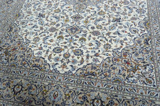 Close-up detail of 2000s Kashan rug from Iran / Persia showing Wool weave