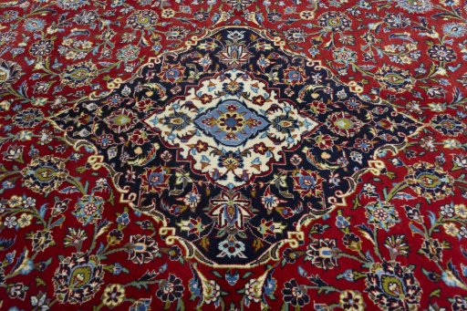 Central medallion detail of 2000s Kashan rug from Iran / Persia