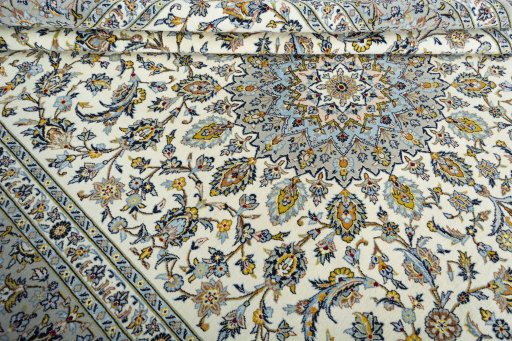 Close-up detail of 2000s Kashan rug from Iran / Persia showing Wool weave