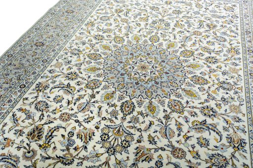 Backside of handmade 2000s Kashan rug showing knot structure and weave density