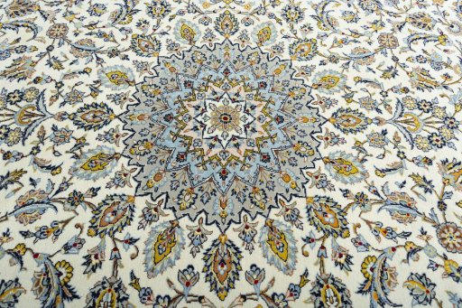 Central medallion detail of 2000s Kashan rug from Iran / Persia