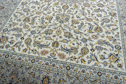 Close-up detail of 2000s Kashan rug from Iran / Persia showing Wool weave