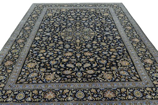 Surface texture of 2000s Kashan rug with natural Wool and intricate pattern