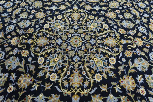 Central medallion detail of 2000s Kashan rug from Iran / Persia