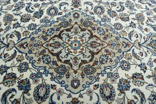 Central medallion detail of 2000s Kashan rug from Iran / Persia