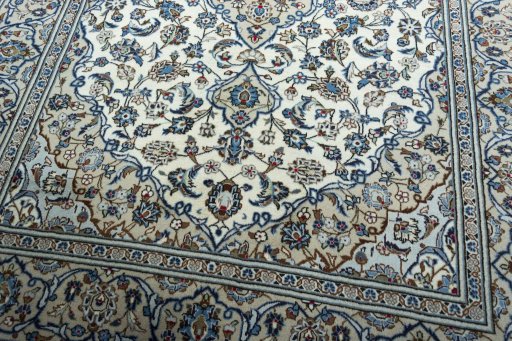 Close-up detail of 2000s Kashan rug from Iran / Persia showing Wool weave