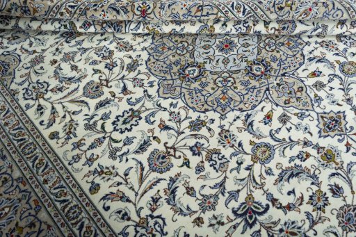 Close-up detail of 2000s Kashan rug from Iran / Persia showing Wool weave