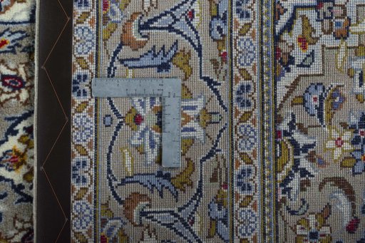 Surface texture of 2000s Kashan rug with natural Wool and intricate pattern