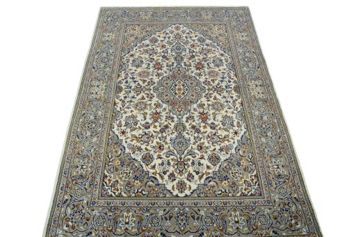 Surface texture of 2000s Kashan rug with natural Wool and intricate pattern
