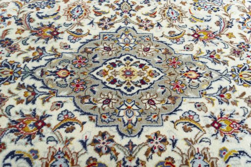 Central medallion detail of 2000s Kashan rug from Iran / Persia