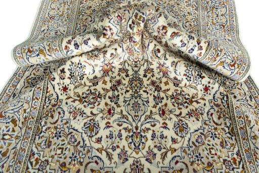 Close-up detail of 2000s Kashan rug from Iran / Persia showing Wool weave