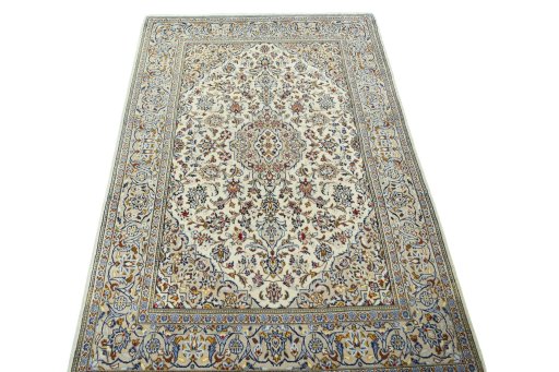 Surface texture of 2000s Kashan rug with natural Wool and intricate pattern