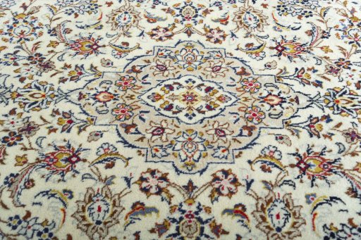 Central medallion detail of 2000s Kashan rug from Iran / Persia